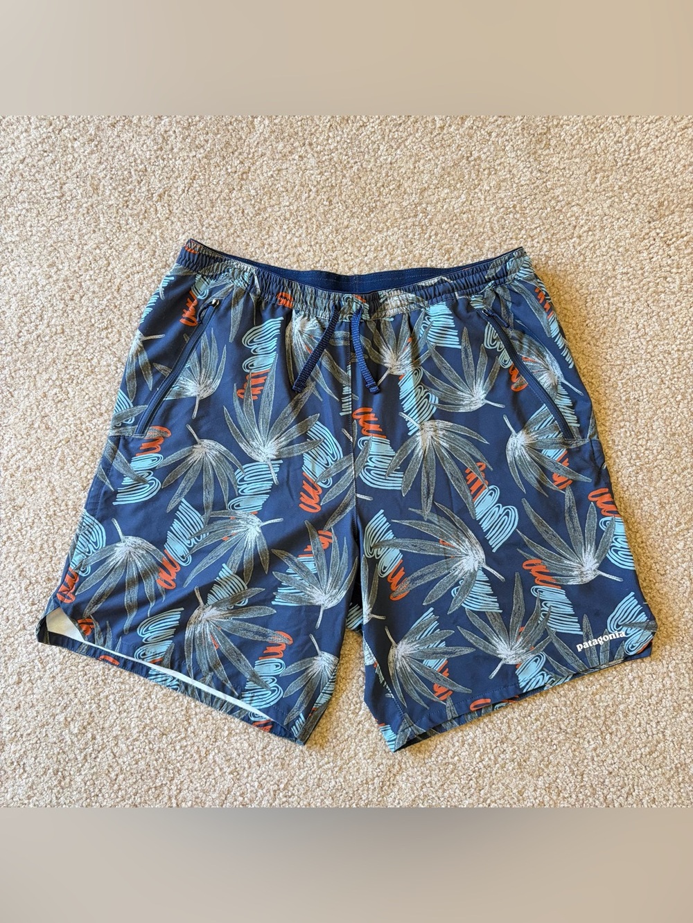 Patagonia Blue Tropical Leaf Swim Shorts with Orange Accents